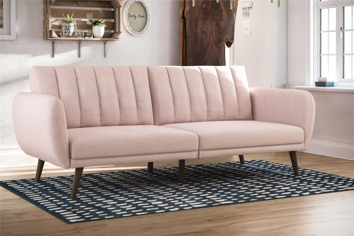 Brittany Futon with Vertical Channel Tufting and Curved Armrests - Pink