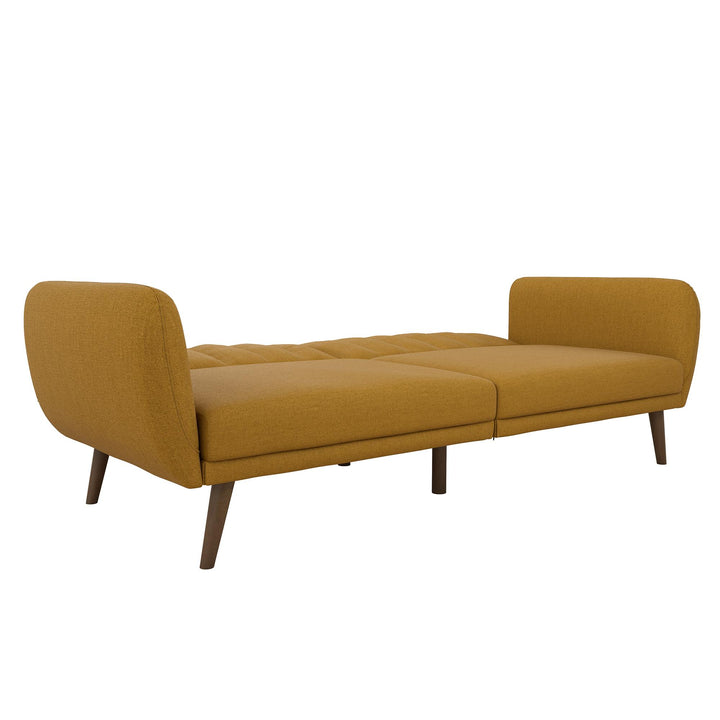 Brittany Futon with Vertical Channel Tufting and Curved Armrests - Mustard