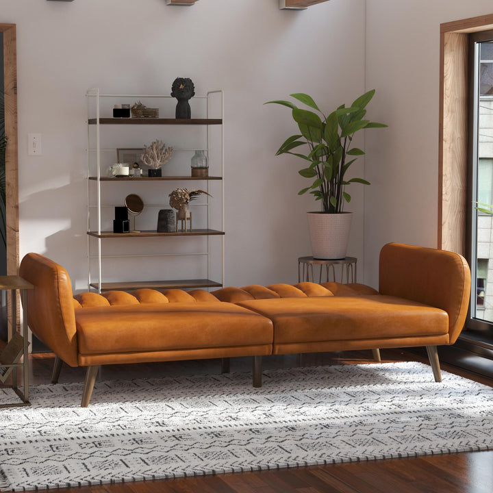 Brittany Futon with Vertical Channel Tufting and Curved Armrests - Camel Faux Leather