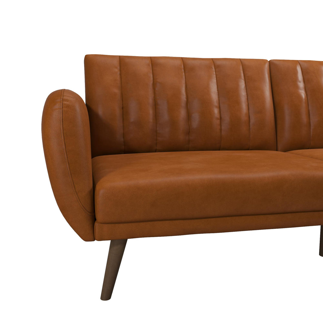 Brittany Futon with Vertical Channel Tufting and Curved Armrests - Camel Faux Leather