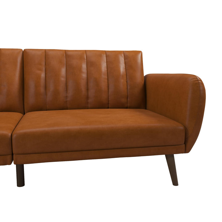 Brittany Futon with Vertical Channel Tufting and Curved Armrests - Camel Faux Leather