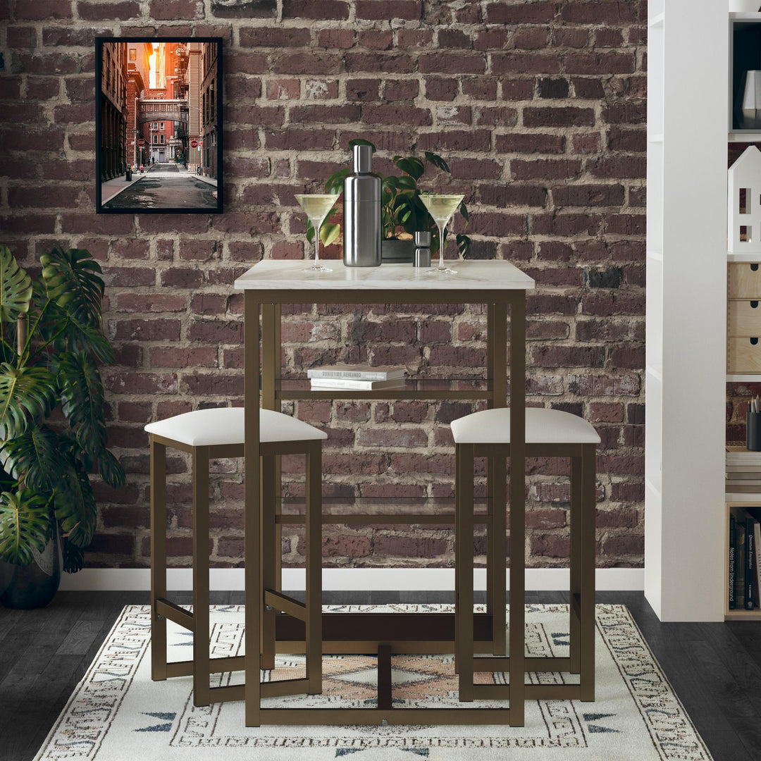 Tanner 3 Piece Brass Pub Set with 2 Bar Stools, a Faux Marble Top and 3 Storage Shelves - White